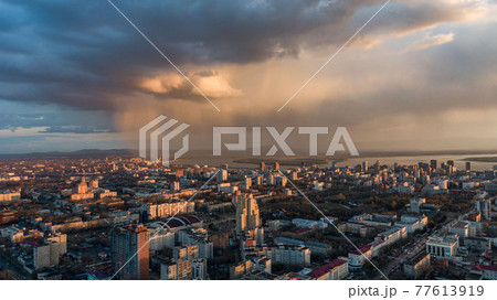 Khabarovsk city top view sunset beautiful clouds in the rain 77613919