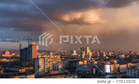 Khabarovsk city top view sunset beautiful clouds in the rain 77613920