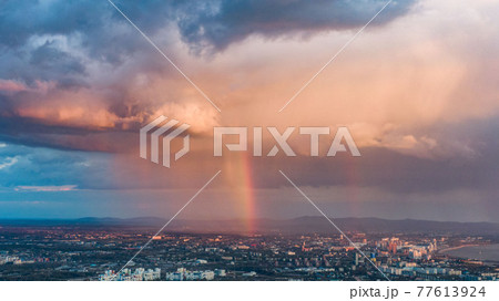 Khabarovsk city top view sunset beautiful clouds in the rain 77613924