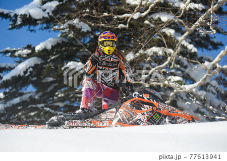 Sakhalin, Russian - January 23, 2015 : snowmobile in the mountains 77613941