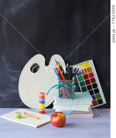 Books, school supplies on the desk, learning concept, back to school  77623006