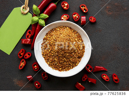 Red chili pepper, dried chillies on dark background. Top view 77625836