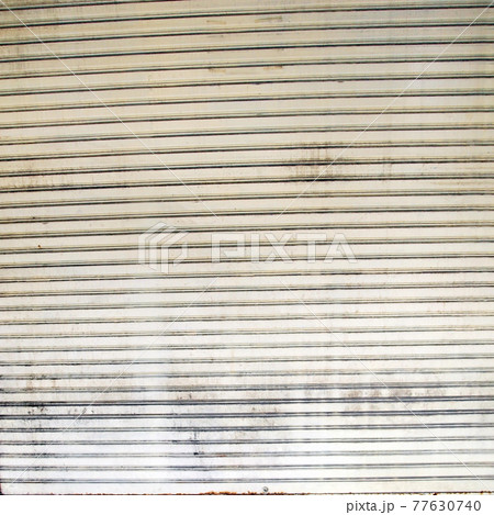 Illuminated grunge metallic roller shutter door Illuminated grunge metallic roller shutter door 77630740