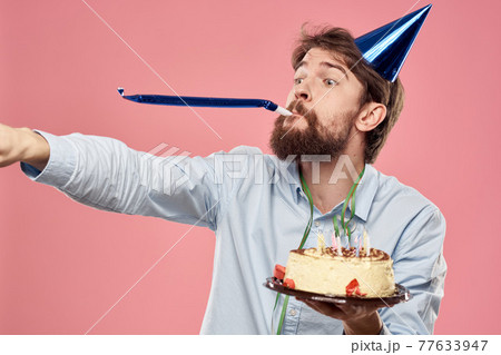 bearded man with cake on pink background emotions cropped view bearded man with cake on pink background emotions cropped view 77633947