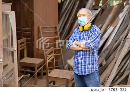 Portrait of elder wood worker hobby for good retirement, Asian male mature professional master of wood craft furniture wooden maker man. Portrait of elder wood worker hobby for good retirement, Asian male mature professional master of wood craft furniture wooden maker man. 77634521