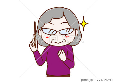 先生風の眼鏡をかけてキリっとして指示棒を持つ高齢の女性 先生風の眼鏡をかけてキリっとして指示棒を持つ高齢の女性 77634741