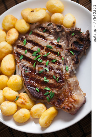Grilled Beefsteak with Baby Roasted Potatoes. High quality photo. 77640251