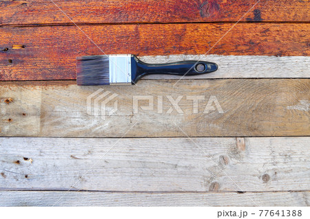 Rustic Wood Surface Restoration Coating With Paintbrush Rustic Wood Surface Restoration Coating With Paintbrush 77641388