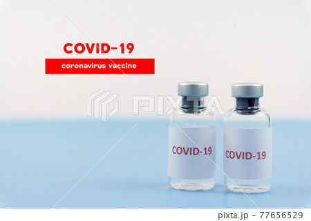 Corona virus vaccine in bottles. The medical concept. 77656529