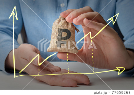 concept of the growth of the ruble currency rate with an abstract graph of growth with an arrow and a hand holding a money bag 77659263