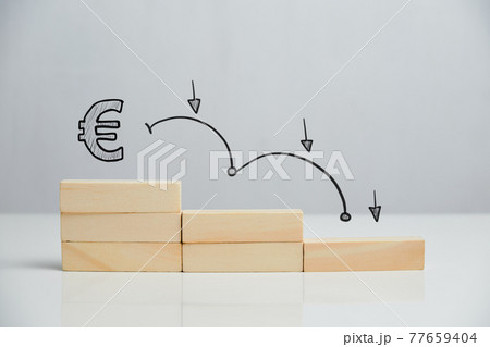 Concept of falling euro sterling currency rate on stairs with downward arrow Concept of falling euro sterling currency rate on stairs with downward arrow 77659404