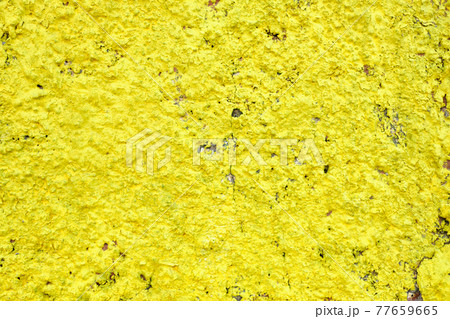 Texture and background of yellow stucco. 77659665