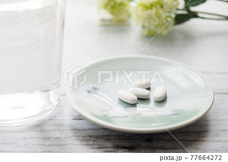 朝夕食後の抗がん剤錠剤の服用 77664272