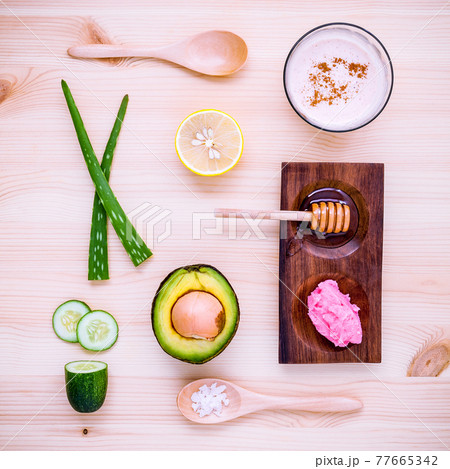 Homemade skin care and body scrub with natural ingredients  set up on wooden background. 77665342