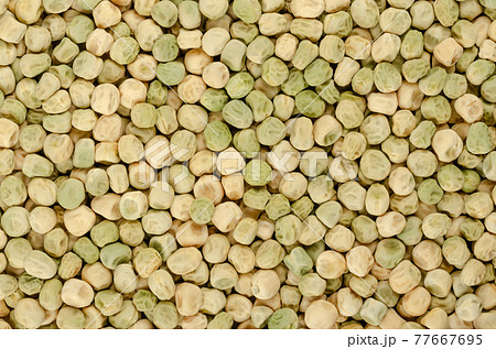 Snow pea seeds, background, from above. Also Chinese pea or pois mangetout, an edible-pod pea with flat pods and thin pod walls. Dried fruits of Pisum sativum used for sprouting. Backdrop. Food photo. Snow pea seeds, background, from above. Also Chinese pea or pois mangetout, an edible-pod pea with flat pods and thin pod walls. Dried fruits of Pisum sativum used for sprouting. Backdrop. Food photo. 77667695