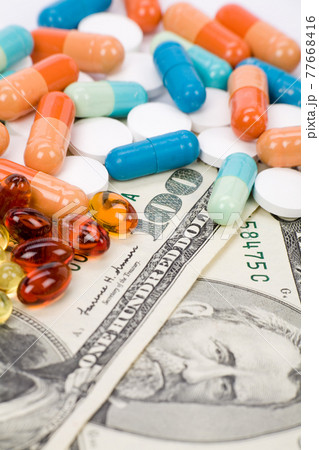Medicine pills and dollar Medicine pills and dollar 77668416