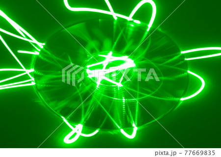 CD under green laser beam CD under green laser beam 77669835