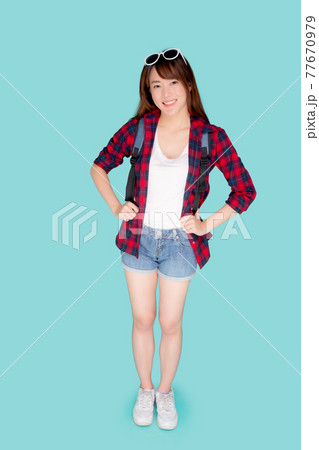 Beautiful portrait young asian woman wear sunglasses on head smile expression confident enjoy. 77670979