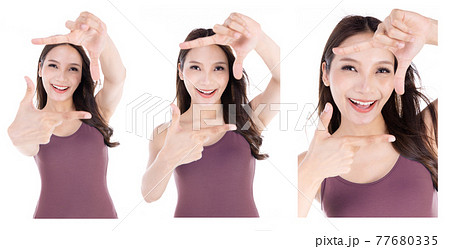 Happy woman making frame with fingers isolated on a white background Happy woman making frame with fingers isolated on a white background 77680335