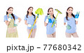 Portrait of young Asian woman wearing green rubber gloves for hands protection during cleaning isolated over white background. 77680342