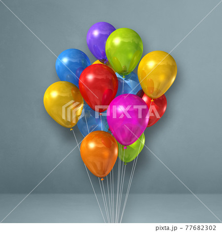Colorful balloons bunch on a grey wall background Colorful balloons bunch on a grey wall background 77682302