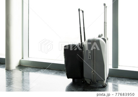 traveling luggage in airport terminal traveling luggage in airport terminal 77683950