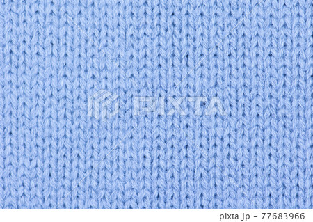 Blue wool knitted background. 77683966