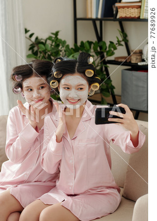 Pretty girls taking selfie 77689926