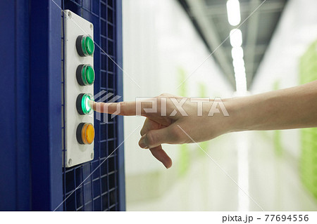 Person using the elevator Person using the elevator 77694556