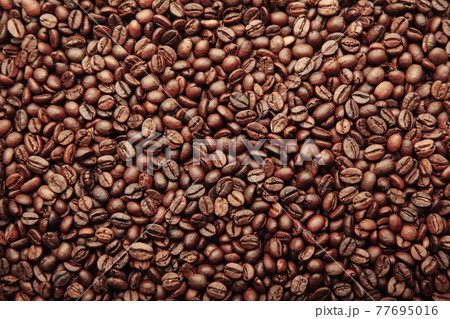 Roasted coffee beans with background 77695016