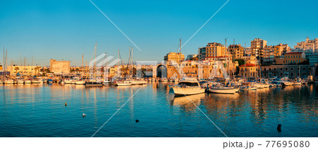 Venetian Fort in Heraklion and moored fishing boats, Crete Island, Greece 77695080