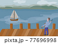 Man standing on the edge of the pier for ships. 77696998