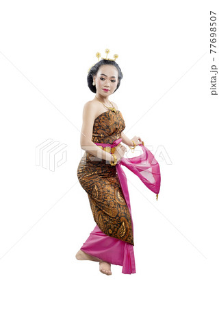 Asian woman dancing Java traditional dance (Sekar Puri dance) 77698507