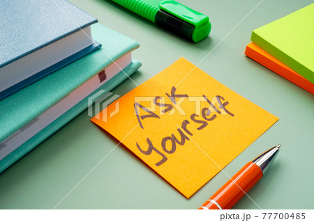 Motivational sign Ask yourself on the workplace. Motivational sign Ask yourself on the workplace. 77700485