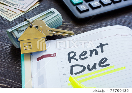 Rent due sign in the planner and key. Rent due sign in the planner and key. 77700486