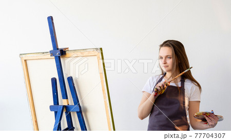 inspired female artist creating picture painting inspired female artist creating picture painting 77704307