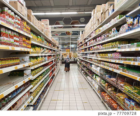 SEREMBAN, MALAYSIA -MARCH 2, 2021: Interior of a hypermarket. Daily necessities and groceries are displayed on sales shelves and price tagged. Sorted by type and brand. 77709728