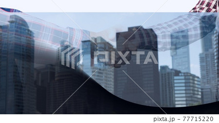 Technology background over mid section of two businessmen shaking hands against tall buildings 77715220