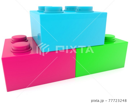 Three different colored toy bricks in close-up 77723248