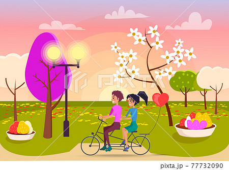 Boy and Girl Rides on Double Bicycle on Park Path 77732090