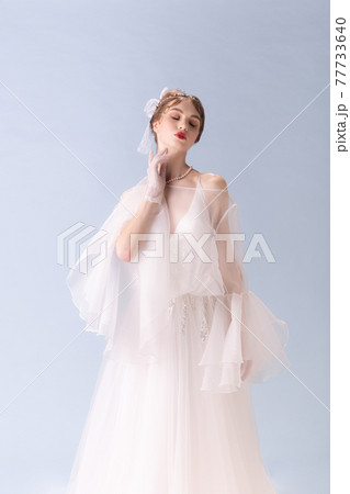 Young woman in art action isolated on white background. Retro style, comparison of eras concept. 77733640