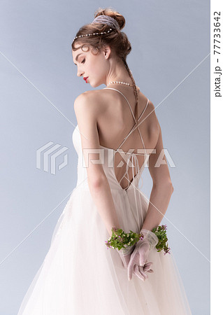 Young woman in art action isolated on white background. Retro style, comparison of eras concept. Young woman in art action isolated on white background. Retro style, comparison of eras concept. 77733642