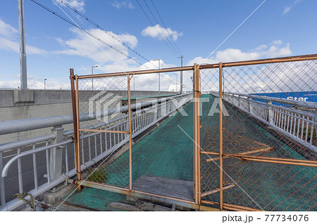 夢舞大橋の南東側の歩道-舞洲側の歩道の入り口付近とフェンス(2019年1月) 夢舞大橋の南東側の歩道-舞洲側の歩道の入り口付近とフェンス(2019年1月) 77734076