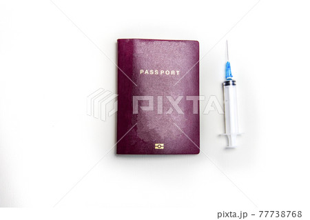 International biometric COVID-19 vaccination passport, syringe traveling in pandemic worlwide concept on white background top view, copy space International biometric COVID-19 vaccination passport, syringe traveling in pandemic worlwide concept on white background top view, copy space 77738768