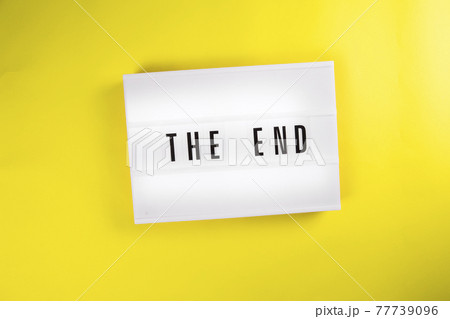 Lightbox with text THE END on yellow background, finish, end of year, clearance Lightbox with text THE END on yellow background, finish, end of year, clearance 77739096