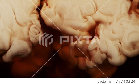 Milk being pour into coffee drink. 77740324