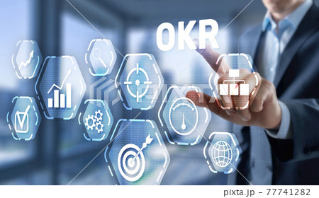 Man Hand touching OKR inscription, 2021 technology concept 77741282