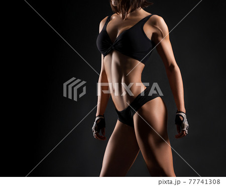 Fitness woman studio shots 77741308