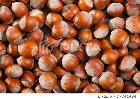 Hazelnuts as background closeup Hazelnuts as background closeup 77741434