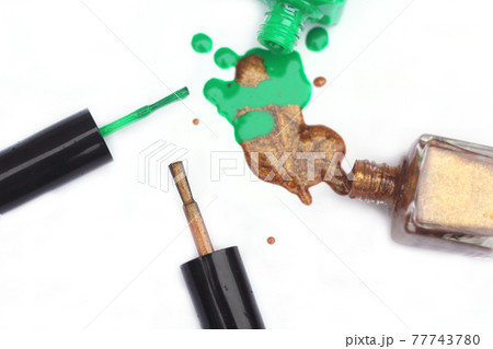 Green and Gold Nail polish Spilled Green and Gold Nail polish Spilled 77743780